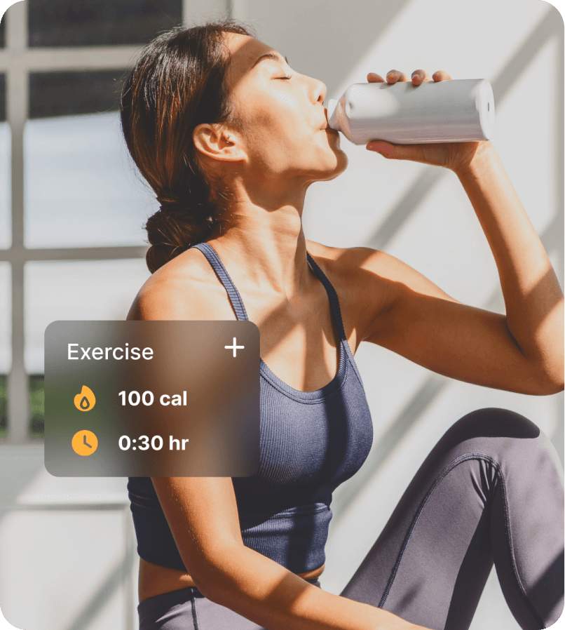 Woman drinking water during a workout with a view of the MyFitnessPal app's exercise card, which shows that she burned 100 calories in 30 minutes.